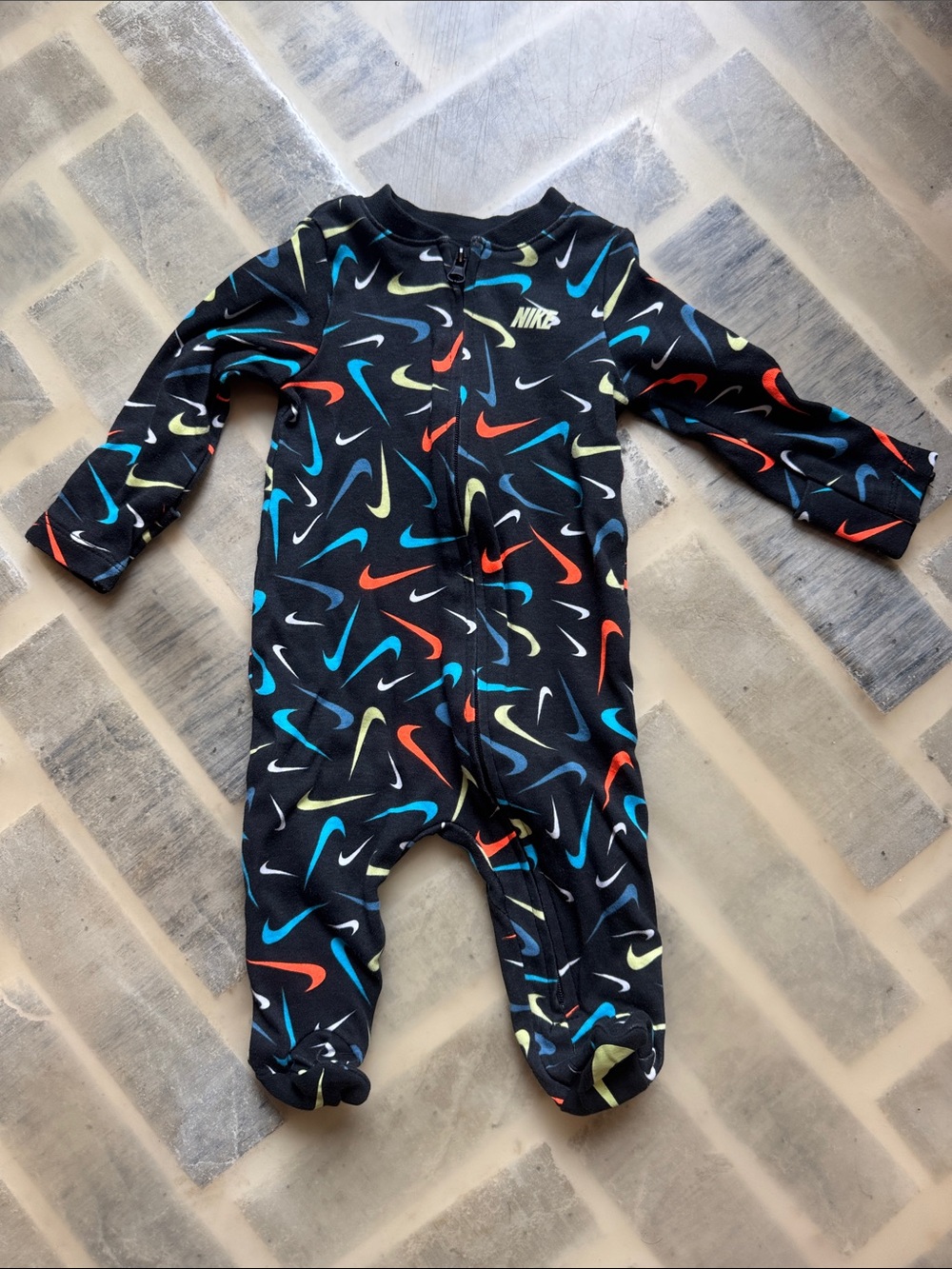 Nike Black Footed Baby One-Piece with Multi Color Swooshes